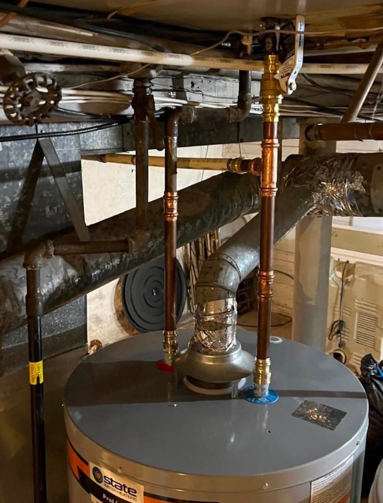 State water heater installation with copper supply lines — Buffalo NY basement