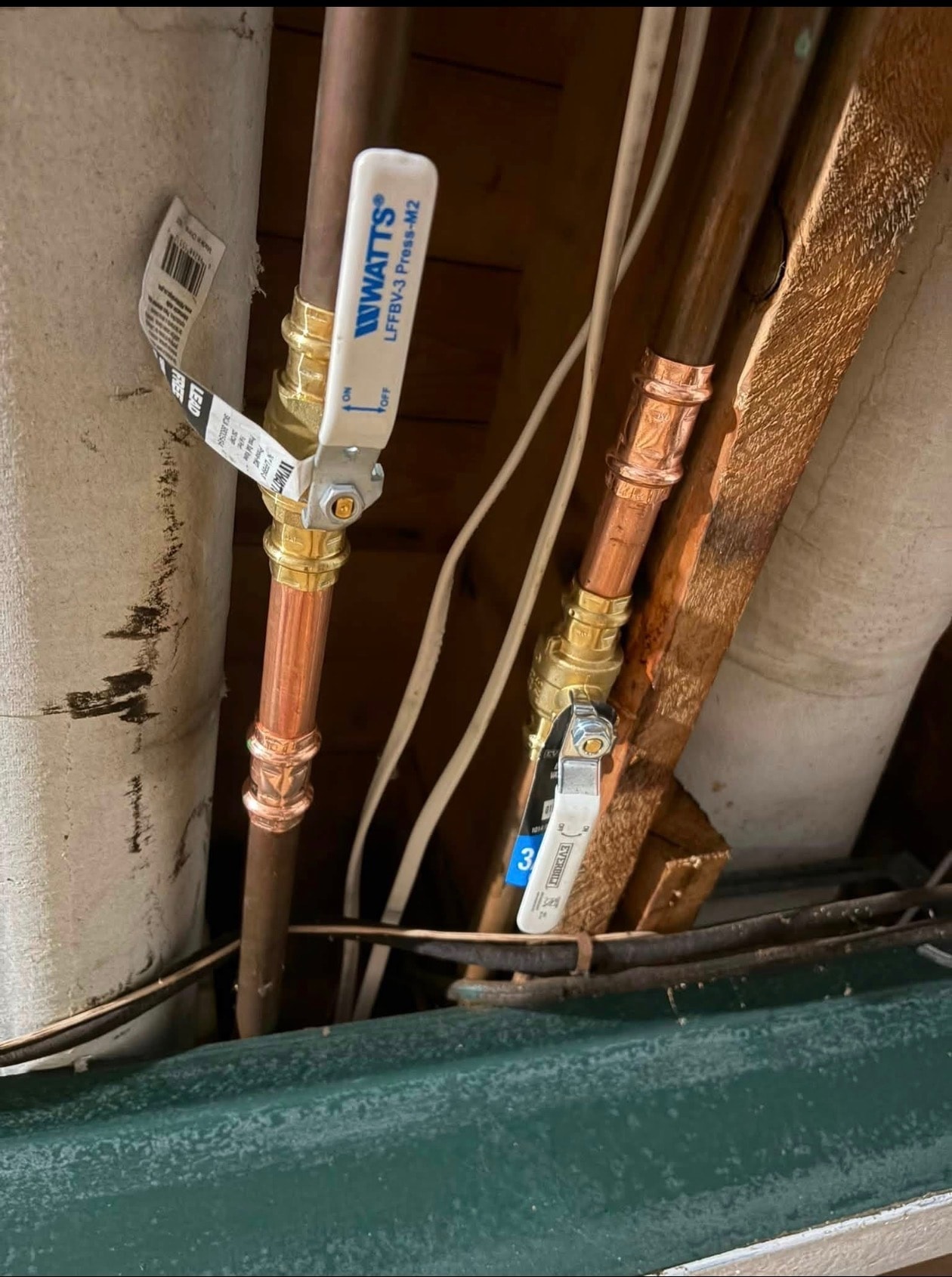 Watts LFFBV-3 press-fit shut-off valves installed on copper supply lines